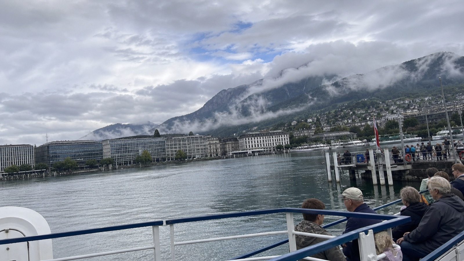 Lake Lucerne under humid September mist from a boat landing