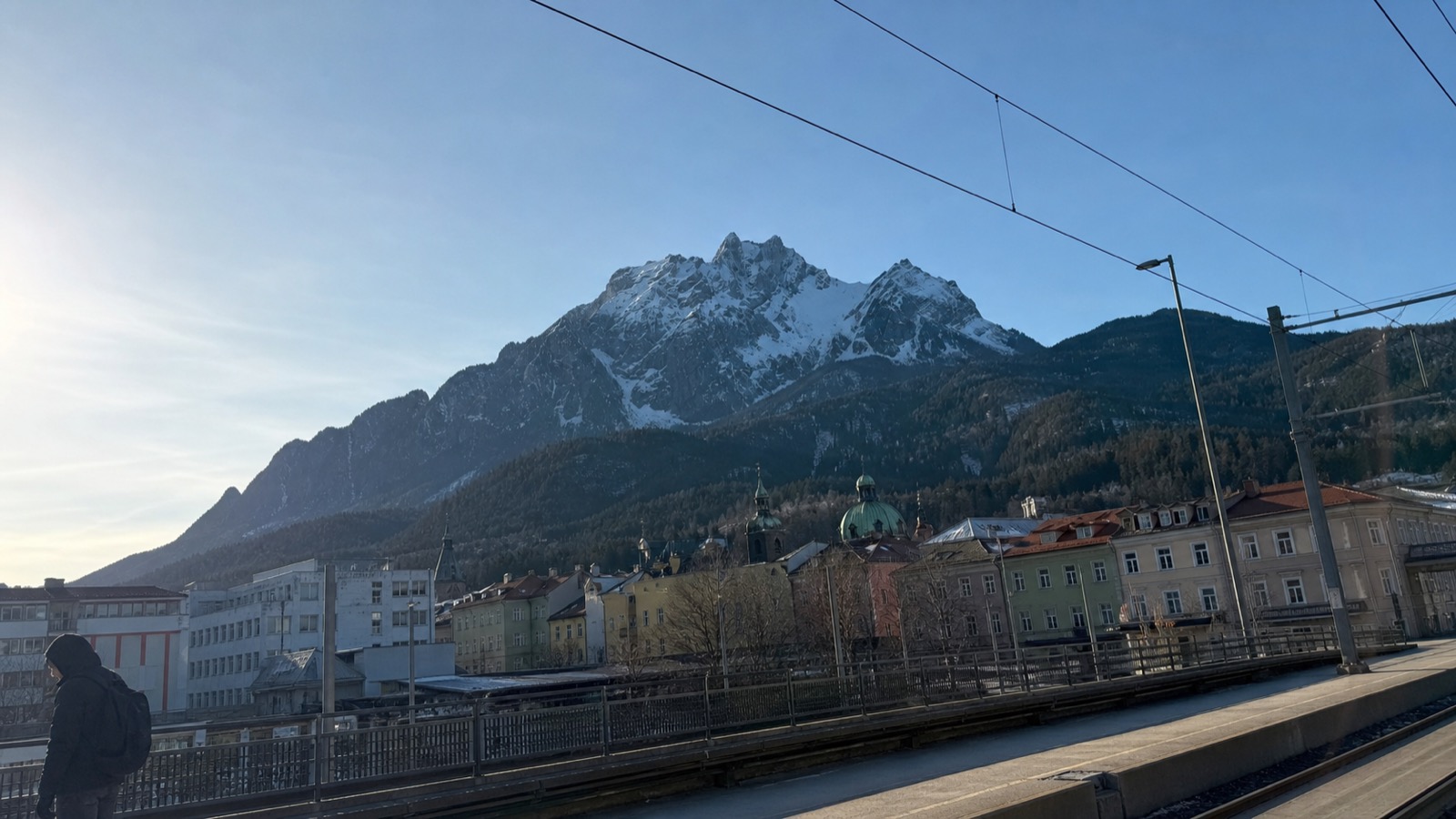 Snowy Nordkette mountains above Innsbruck's rail approach in February