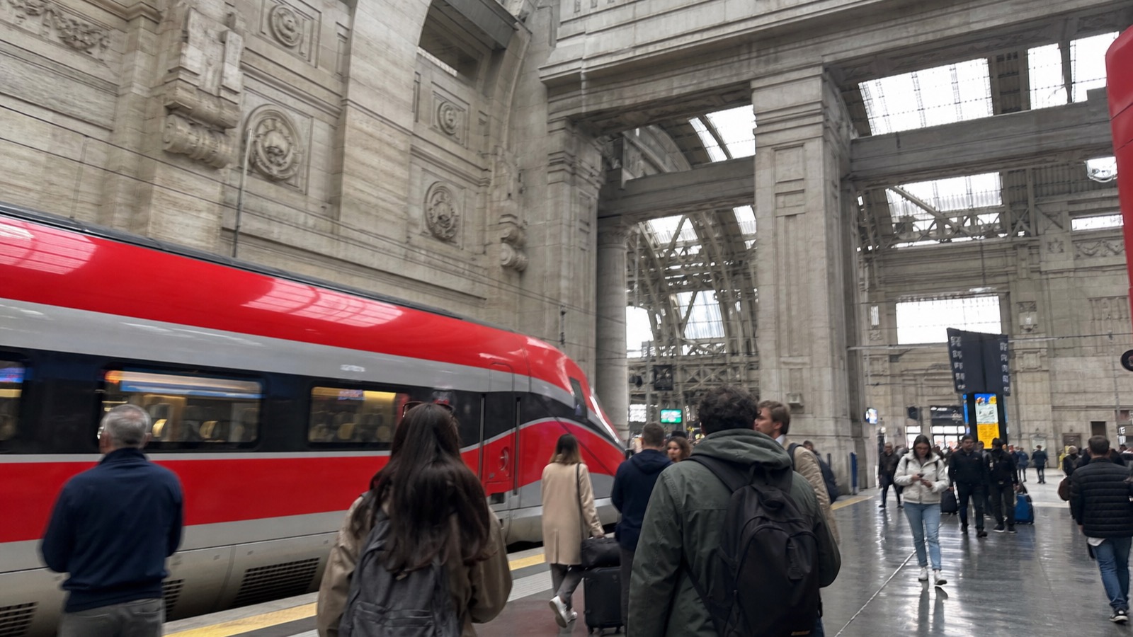 A EuroCity train at a large Italian terminus