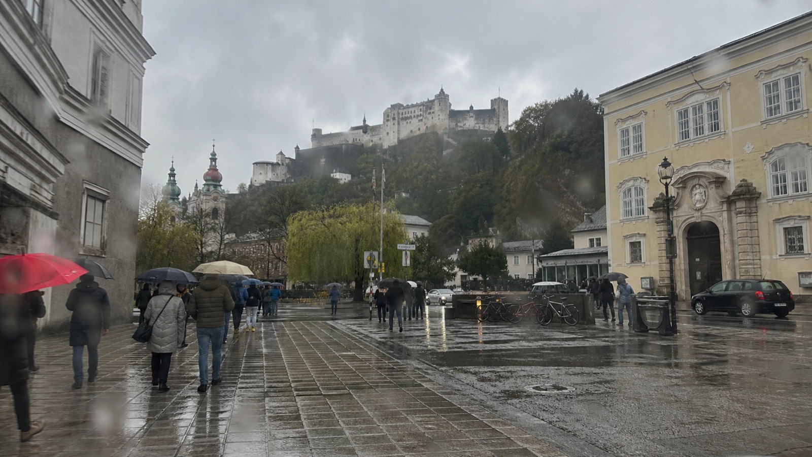 Rainy October pavement in Salzburg's old town